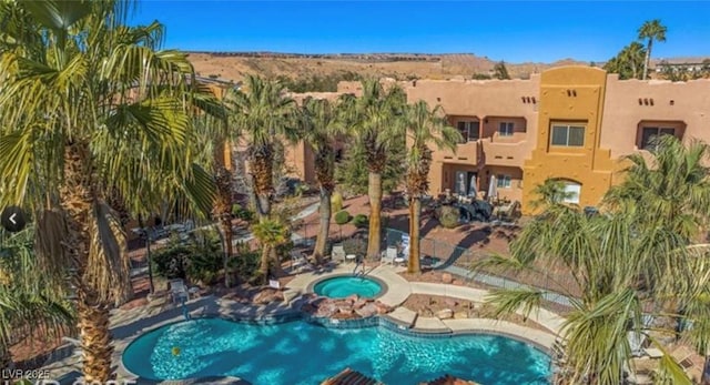 728 Hardy Way Unit E, Mesquite, NV 89027 - community pool featuring a hot tub