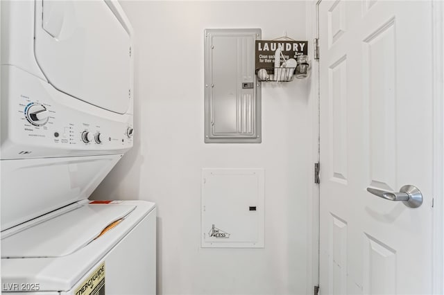 200 W Sahara Ave Unit 3303, Las Vegas, NV 89102 - washroom featuring stacked washer / drying machine and electric panel