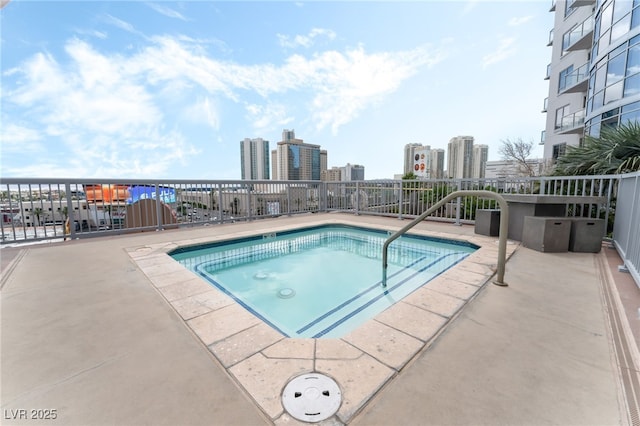 200 W Sahara Ave Unit 3303, Las Vegas, NV 89102 - view of swimming pool with a view of city and a hot tub