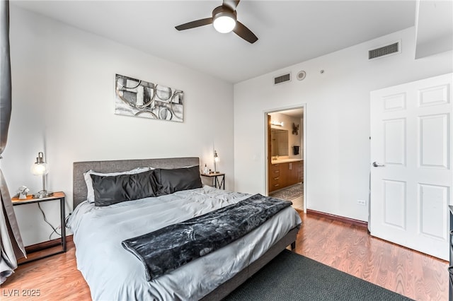 200 W Sahara Ave Unit 3303, Las Vegas, NV 89102 - bedroom featuring wood finished floors, connected bathroom, and a ceiling fan