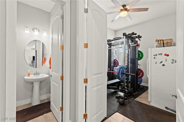 245 Hull St, Henderson, NV 89015 - workout room with a ceiling fan and a sink