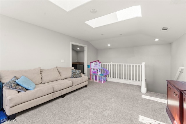245 Hull St, Henderson, NV 89015 - living room featuring a skylight, recessed lighting, carpet flooring, and lofted ceiling