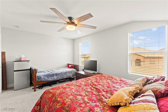 245 Hull St, Henderson, NV 89015 - carpeted bedroom with freestanding refrigerator, ceiling fan, and vaulted ceiling
