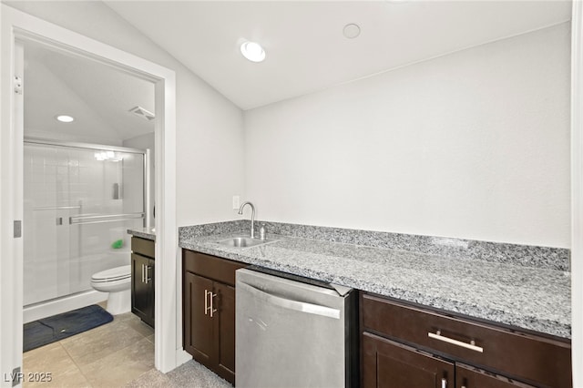 245 Hull St, Henderson, NV 89015 - kitchen featuring dishwasher, dark brown cabinetry, a sink, light stone countertops, and recessed lighting