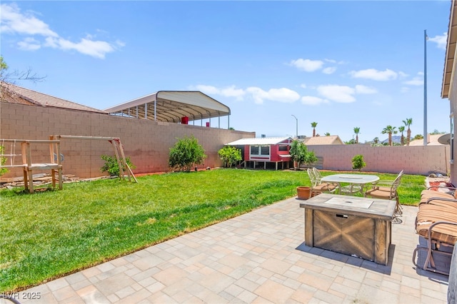 245 Hull St, Henderson, NV 89015 - view of patio with a detached carport and outdoor dining area