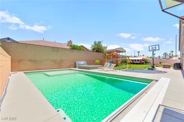 245 Hull St, Henderson, NV 89015 - view of pool featuring a playground and a patio area