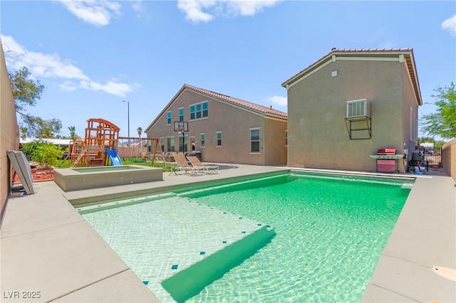 245 Hull St, Henderson, NV 89015 - swimming pool featuring a playground and a patio area