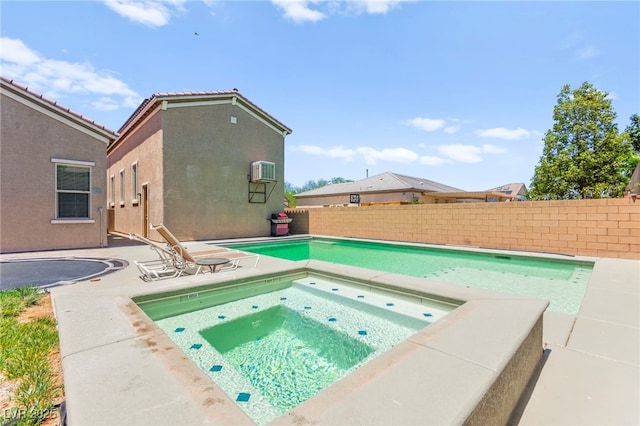 245 Hull St, Henderson, NV 89015 - view of swimming pool featuring an in-ground hot tub, a fenced backyard, and a patio