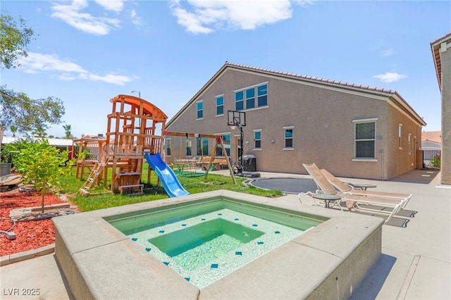 245 Hull St, Henderson, NV 89015 - view of pool with a playground, an in-ground hot tub, and a water slide