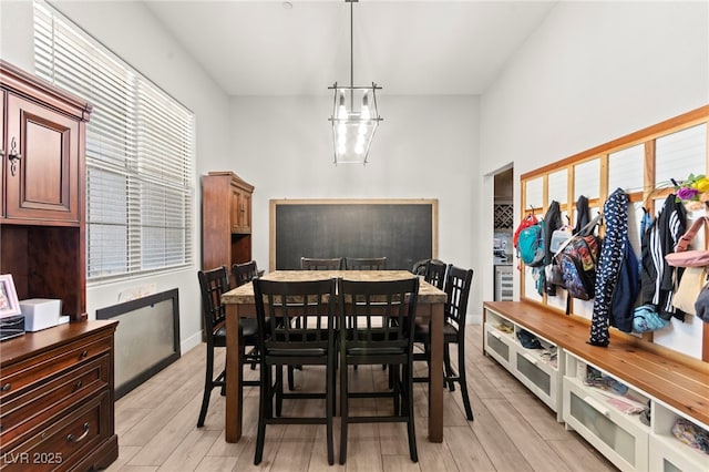 245 Hull St, Henderson, NV 89015 - dining area with light wood-style flooring and baseboards