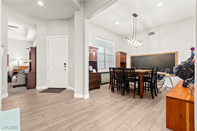 245 Hull St, Henderson, NV 89015 - dining area featuring light wood-style flooring, baseboards, and recessed lighting