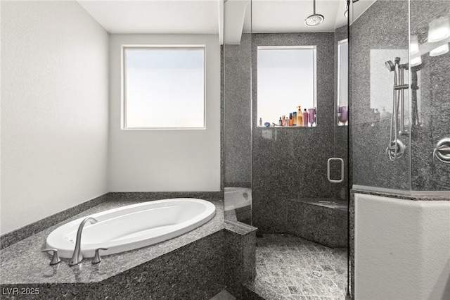 245 Hull St, Henderson, NV 89015 - full bath featuring a shower stall and a garden tub