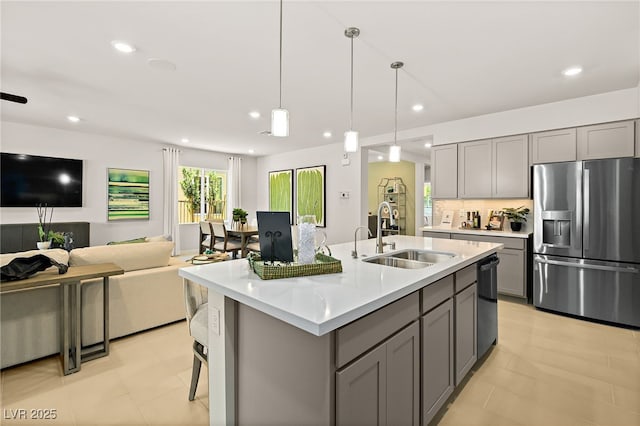 4450 E Brusca Ct, Pahrump, NV 89061 - kitchen with stainless steel fridge, gray cabinetry, a sink, and recessed lighting