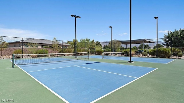 4450 E Brusca Ct, Pahrump, NV 89061 - view of tennis court with community basketball court