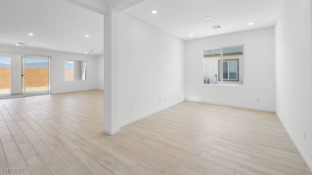 4450 E Brusca Ct, Pahrump, NV 89061 - unfurnished room with light wood-style flooring and recessed lighting