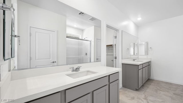 4450 E Brusca Ct, Pahrump, NV 89061 - full bath with a shower stall, two vanities, and recessed lighting