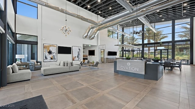 4450 E Brusca Ct, Pahrump, NV 89061 - community lobby with a high ceiling and a wall of windows