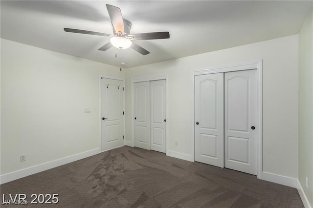 10058 Saint Augustine St, Las Vegas, NV 89183 - unfurnished bedroom with multiple closets, carpet, and baseboards