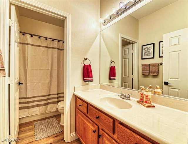 2285 Moresca Ave, Henderson, NV 89052 - full bath featuring toilet, vanity, wood finished floors, and a shower with curtain