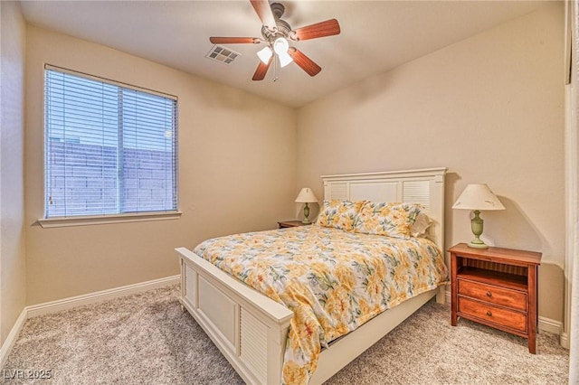 2285 Moresca Ave, Henderson, NV 89052 - bedroom featuring light carpet, baseboards, and a ceiling fan
