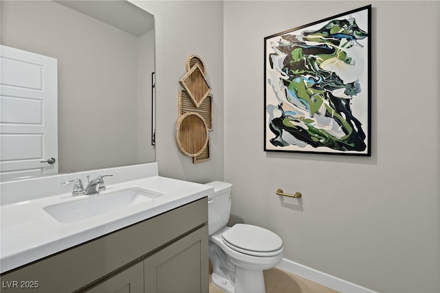 4365 E Brusca Way, Pahrump, NV 89061 - half bath with vanity, toilet, tile patterned flooring, and baseboards