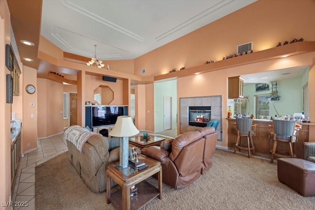 1105 Malachite Ct, Henderson, NV 89011 - tiled living area with a tiled fireplace and baseboards