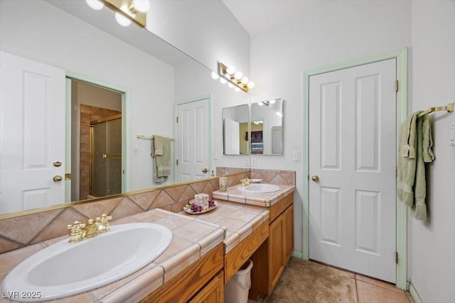 1105 Malachite Ct, Henderson, NV 89011 - full bath with a stall shower, double vanity, and tile patterned flooring