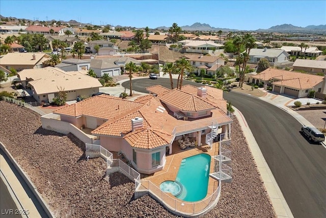 1105 Malachite Ct, Henderson, NV 89011 - aerial perspective of suburban area featuring mountains and a pool