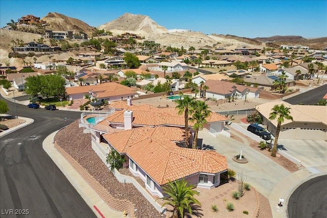 1105 Malachite Ct, Henderson, NV 89011 - aerial perspective of suburban area with a mountainous background