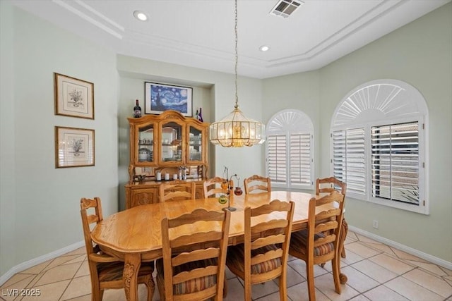 1105 Malachite Ct, Henderson, NV 89011 - dining room with light tile patterned floors, a chandelier, a raised ceiling, baseboards, and recessed lighting