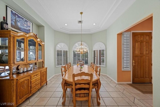 1105 Malachite Ct, Henderson, NV 89011 - dining area with a raised ceiling, a chandelier, light tile patterned flooring, and baseboards