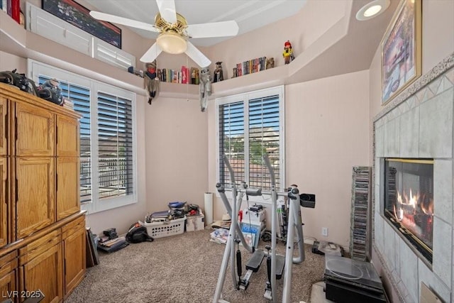 1105 Malachite Ct, Henderson, NV 89011 - workout area featuring plenty of natural light, carpet, a ceiling fan, and a towering ceiling