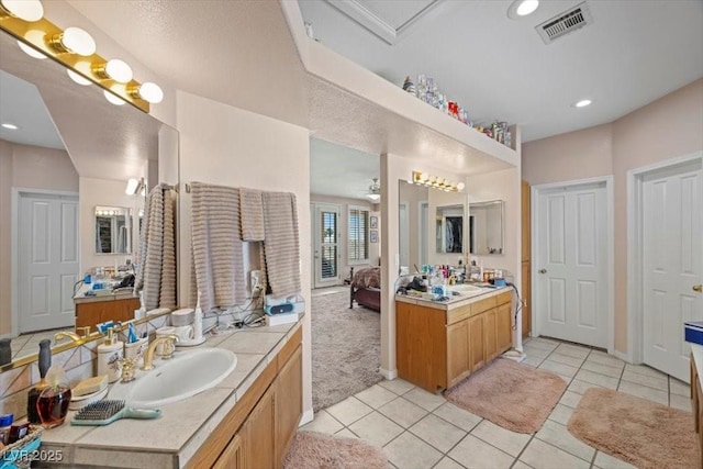 1105 Malachite Ct, Henderson, NV 89011 - bathroom featuring vanity, tile patterned flooring, ensuite bathroom, and recessed lighting