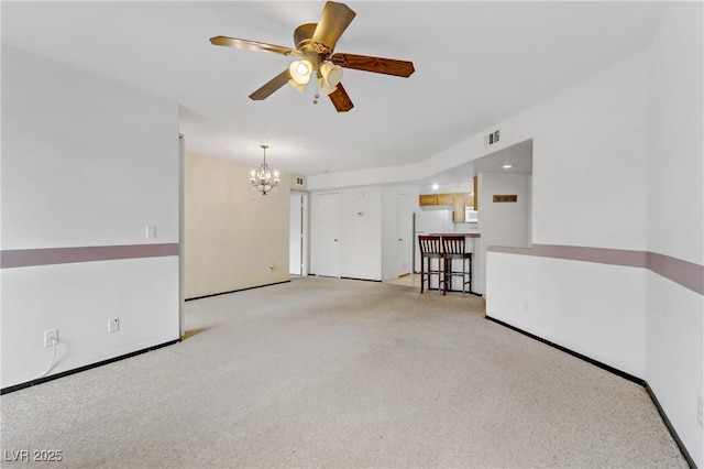 4555 E Sahara Ave Unit 280, Las Vegas, NV 89104 - carpeted empty room with a chandelier and a ceiling fan