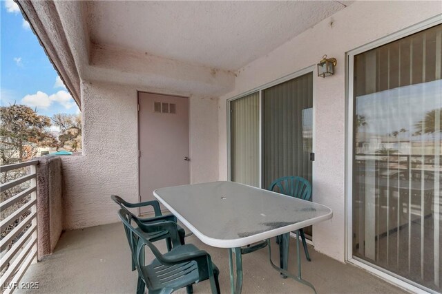 4555 E Sahara Ave Unit 280, Las Vegas, NV 89104 - balcony with outdoor dining space