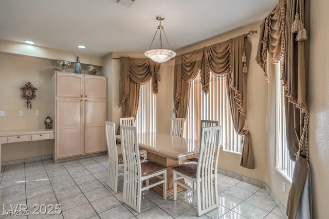 6971 Cedar Basin Ave, Las Vegas, NV 89142 - dining area featuring light tile patterned floors, baseboards, and recessed lighting