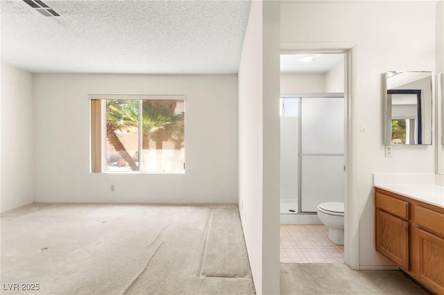 433 Old Palms Dr, Las Vegas, NV 89123 - full bathroom with toilet, vanity, a stall shower, and a textured ceiling