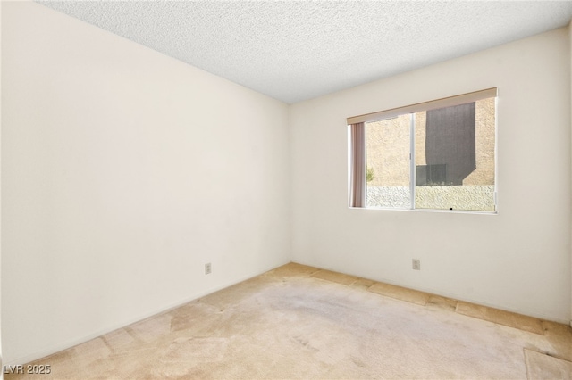 433 Old Palms Dr, Las Vegas, NV 89123 - empty room with light carpet and a textured ceiling