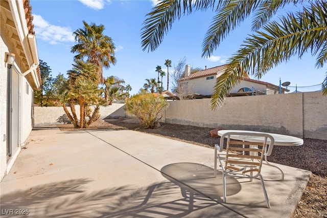 433 Old Palms Dr, Las Vegas, NV 89123 - fenced backyard with a patio area
