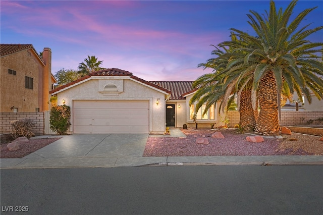 433 Old Palms Dr, Las Vegas, NV 89123 - view of front of property featuring a tiled roof, a garage, driveway, and stucco siding