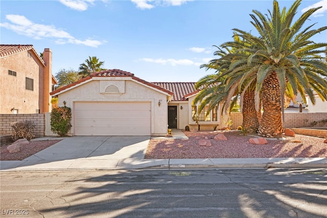 433 Old Palms Dr, Las Vegas, NV 89123 - view of front facade featuring a tiled roof, a garage, stucco siding, and concrete driveway
