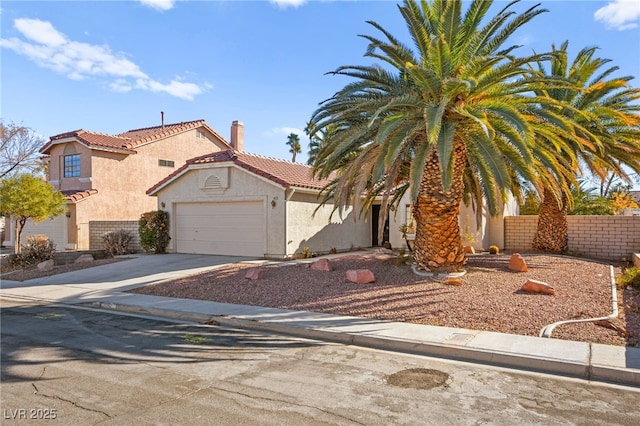 433 Old Palms Dr, Las Vegas, NV 89123 - view of front of house with stucco siding, a tile roof, a garage, driveway, and a chimney