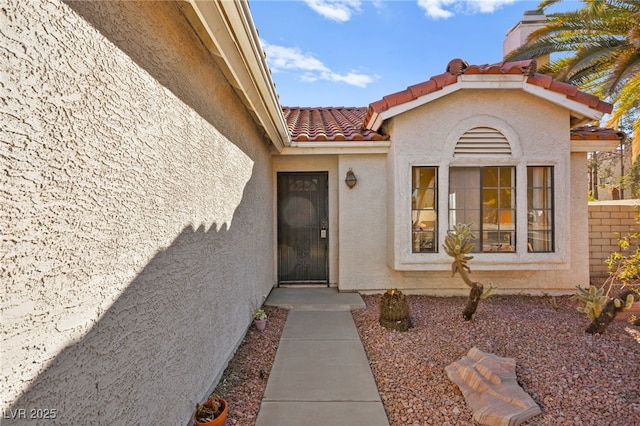 433 Old Palms Dr, Las Vegas, NV 89123 - entrance to property featuring stucco siding and a tiled roof