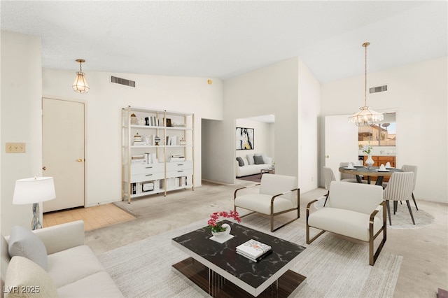 433 Old Palms Dr, Las Vegas, NV 89123 - living area featuring carpet, a chandelier, and vaulted ceiling