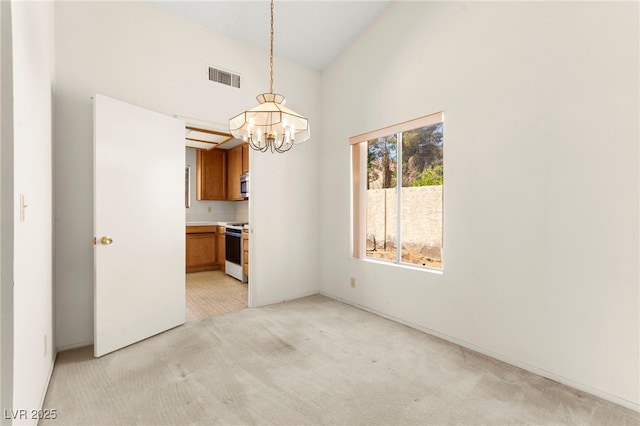 433 Old Palms Dr, Las Vegas, NV 89123 - unfurnished dining area with light carpet, a chandelier, and high vaulted ceiling
