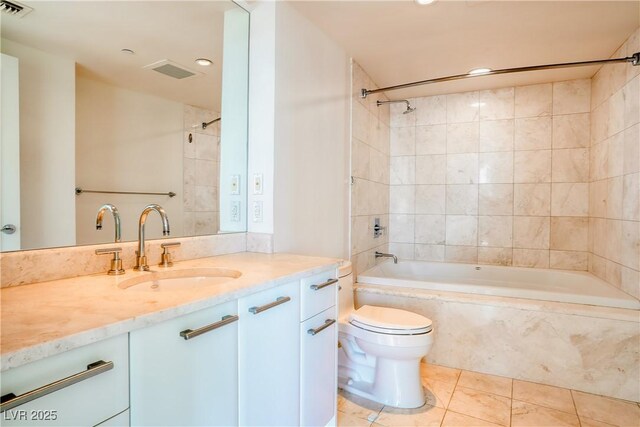 222 Karen Ave Unit 2506, Las Vegas, NV 89109 - full bathroom featuring vanity, toilet, tiled shower / bath combo, tile patterned floors, and recessed lighting
