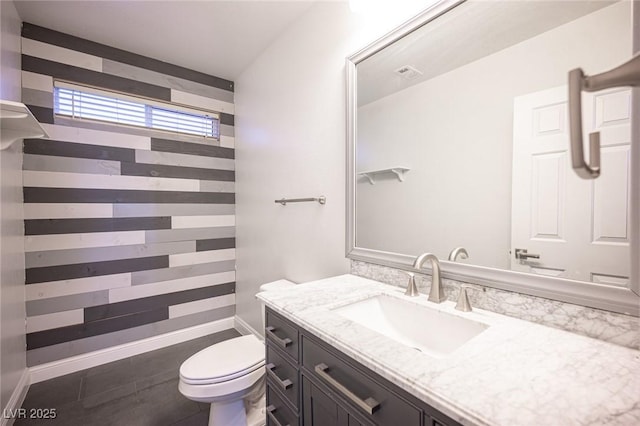 6029 Allanche Ave, Las Vegas, NV 89141 - full bath featuring toilet, vanity, baseboards, tile patterned floors, and a shower