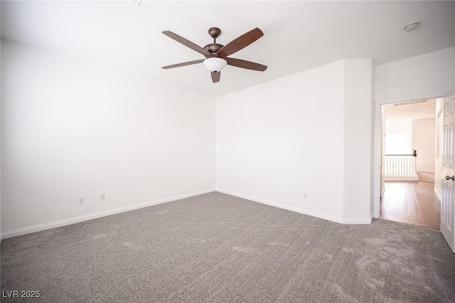6029 Allanche Ave, Las Vegas, NV 89141 - carpeted empty room with a ceiling fan, baseboards, and a smoke detector