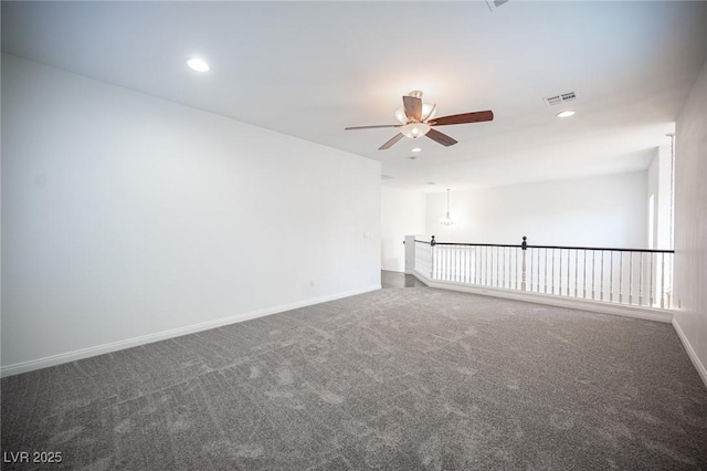 6029 Allanche Ave, Las Vegas, NV 89141 - spare room with a ceiling fan, carpet, baseboards, and recessed lighting
