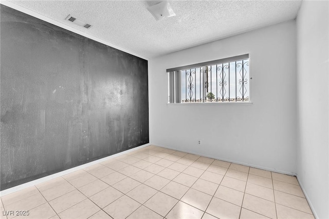 4386 El Cebra Way, Las Vegas, NV 89121 - spare room featuring a textured ceiling and baseboards